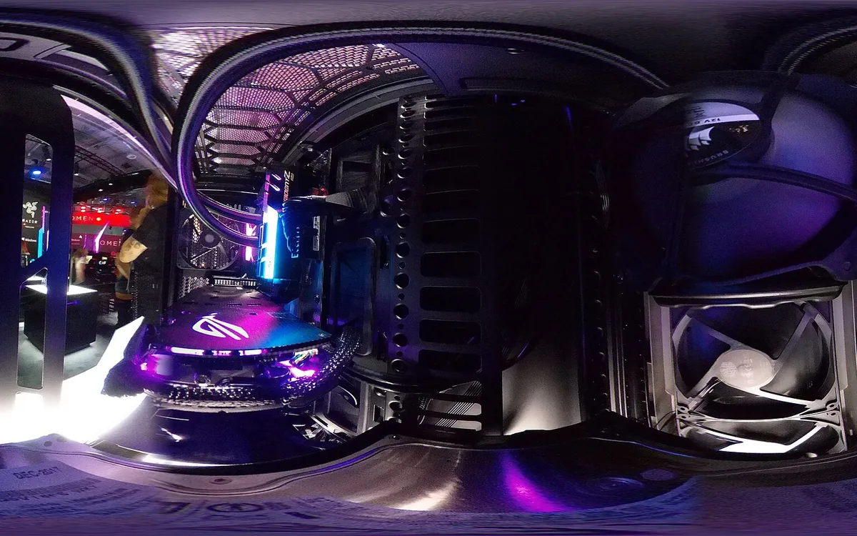 The interior of a gaming PC showing the processor cooler, graphics card and memory together